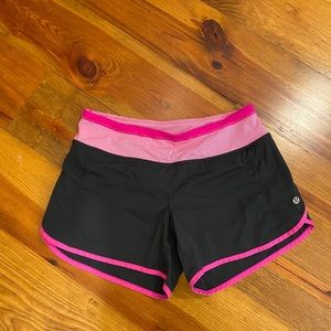 Black and pink Lululemon shorts size 4, 4” inseam